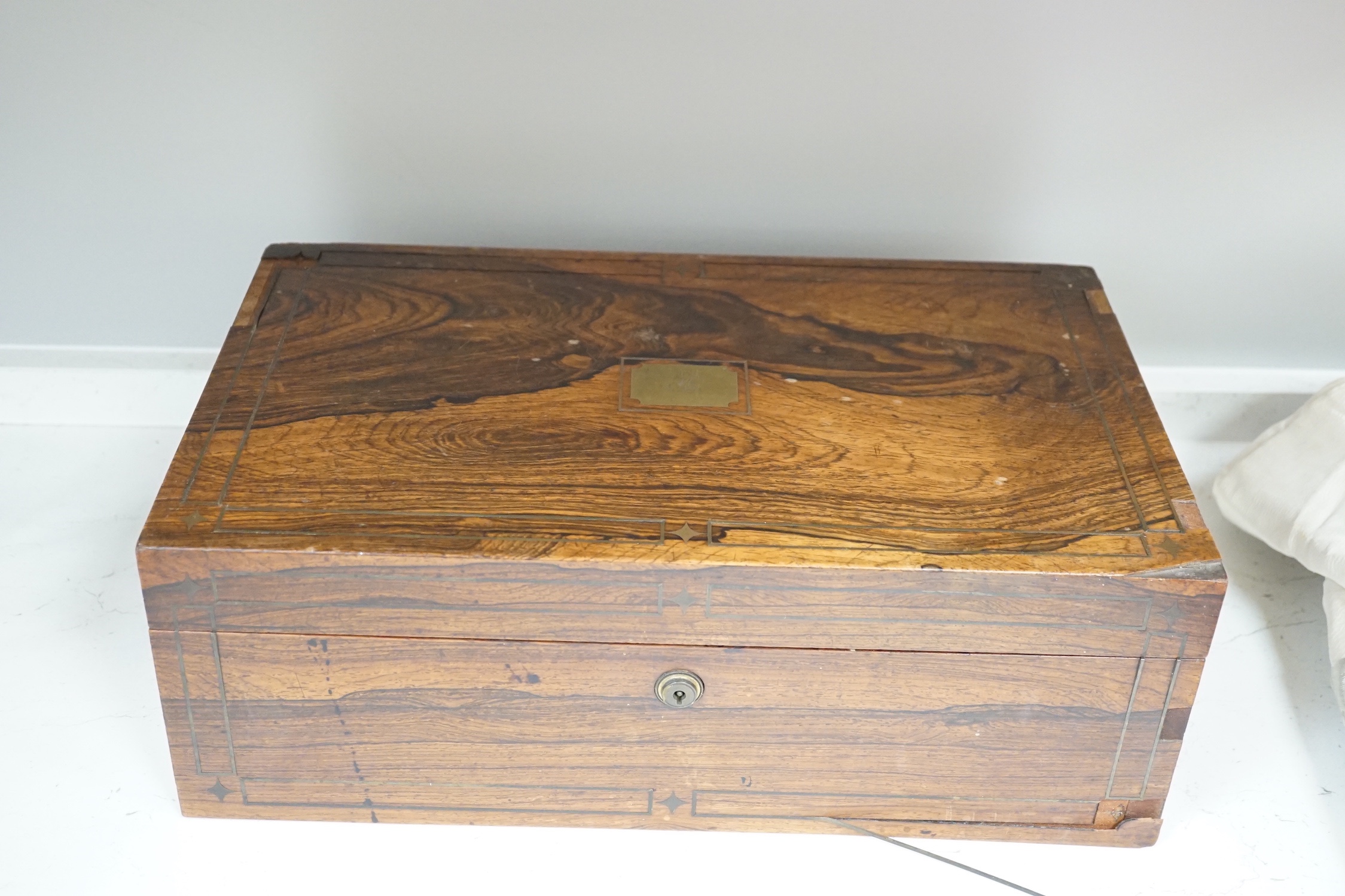 A Victorian rosewood veneered and brass strung writing slope, 43cm
